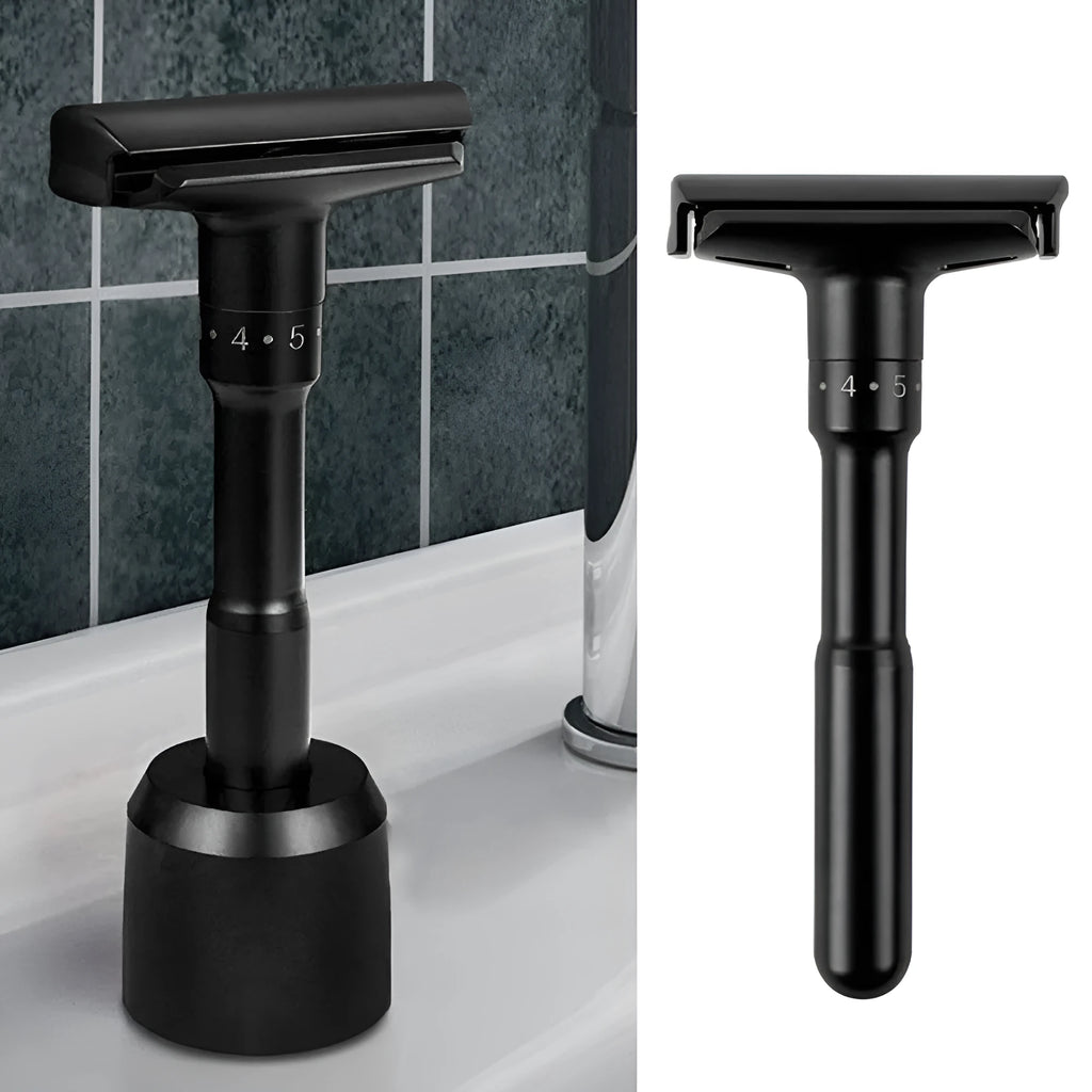 Manual old-fashioned razor with stainless steel blade and zinc alloy handle in black finish on a neutral background