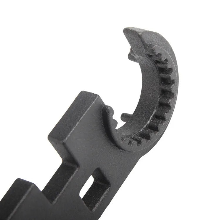 Black all-steel combination wrench for AR15 and M4 firearms on a plain background.