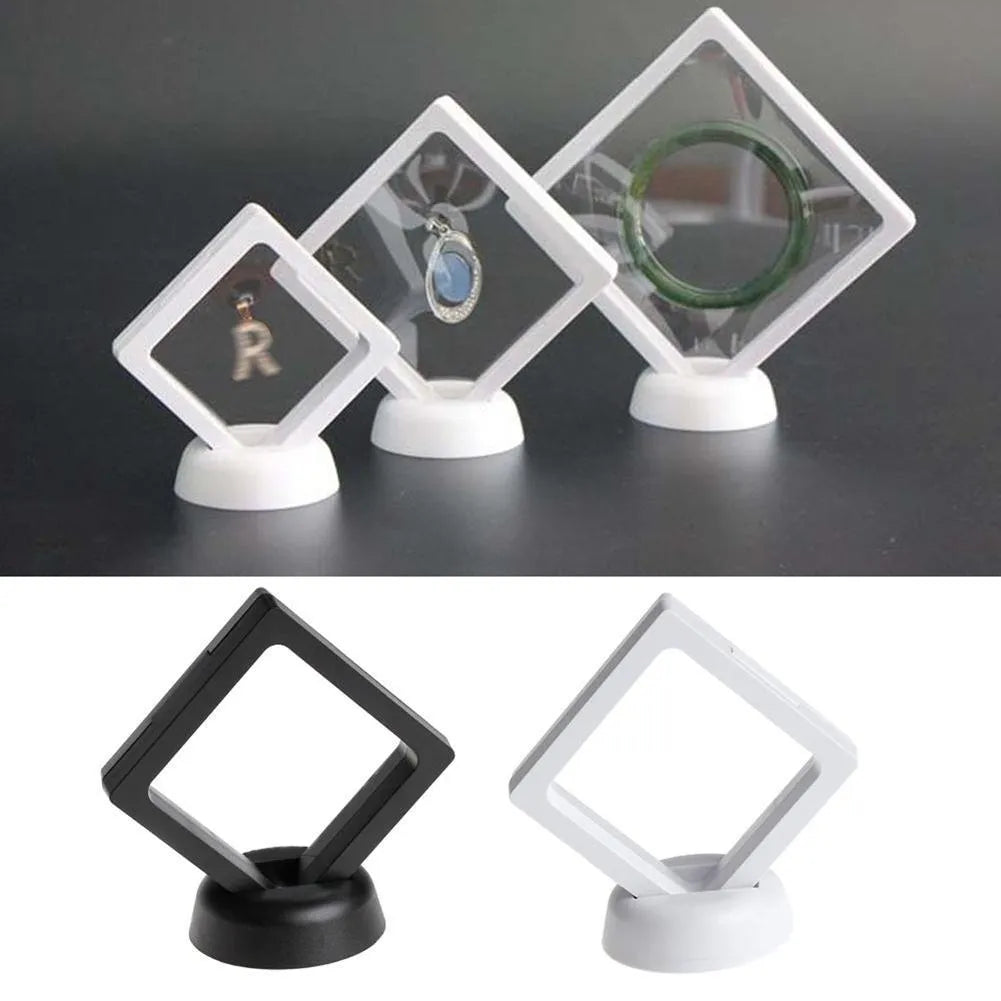 Transparent 3D floating display case holding a coin, with black and white size options