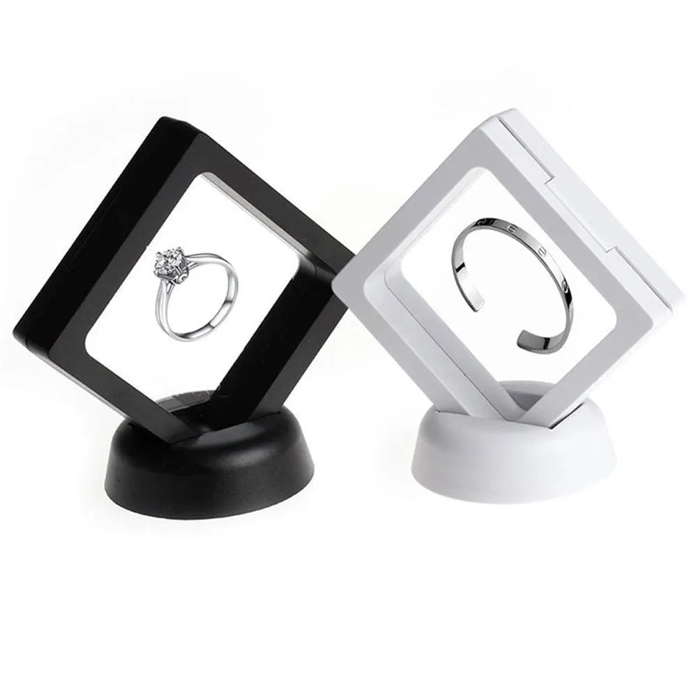 Transparent 3D floating display case holding a coin, with black and white size options