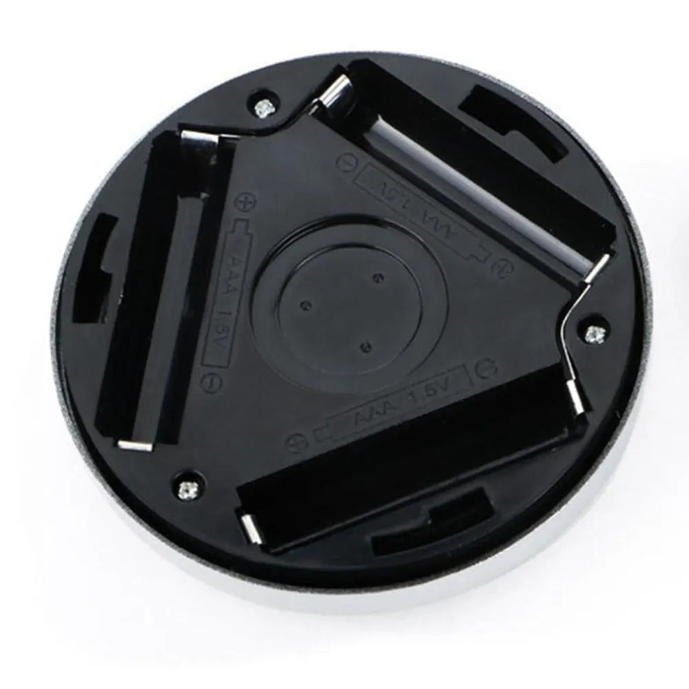 Silver round wireless motion sensor night light with compact 80mm diameter design for cupboards and hallways.