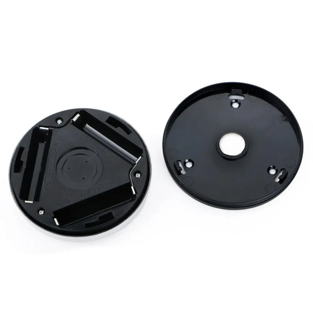 Silver round wireless motion sensor night light with compact 80mm diameter design for cupboards and hallways.