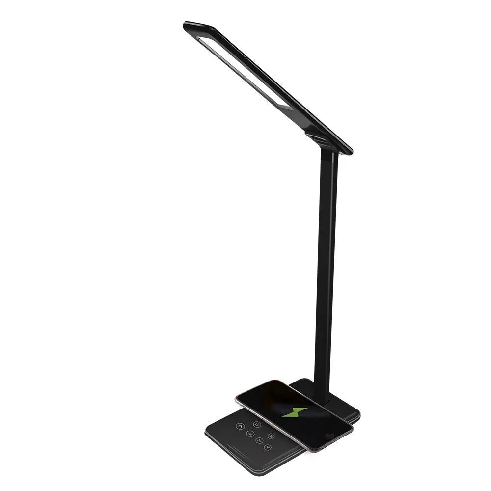 Wireless charging desk lamp with touch control in black finish on a bedside table