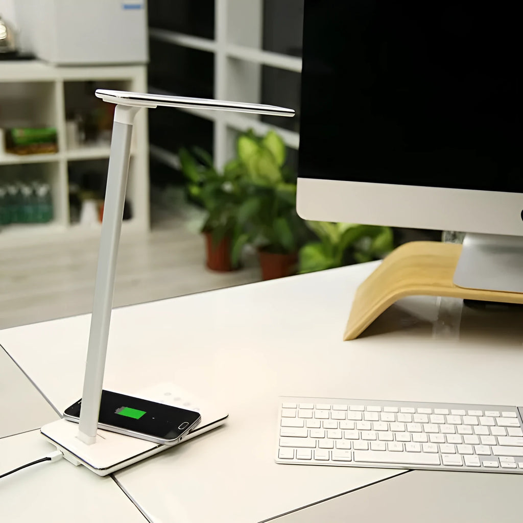 Wireless charging desk lamp with touch control in black finish on a bedside table