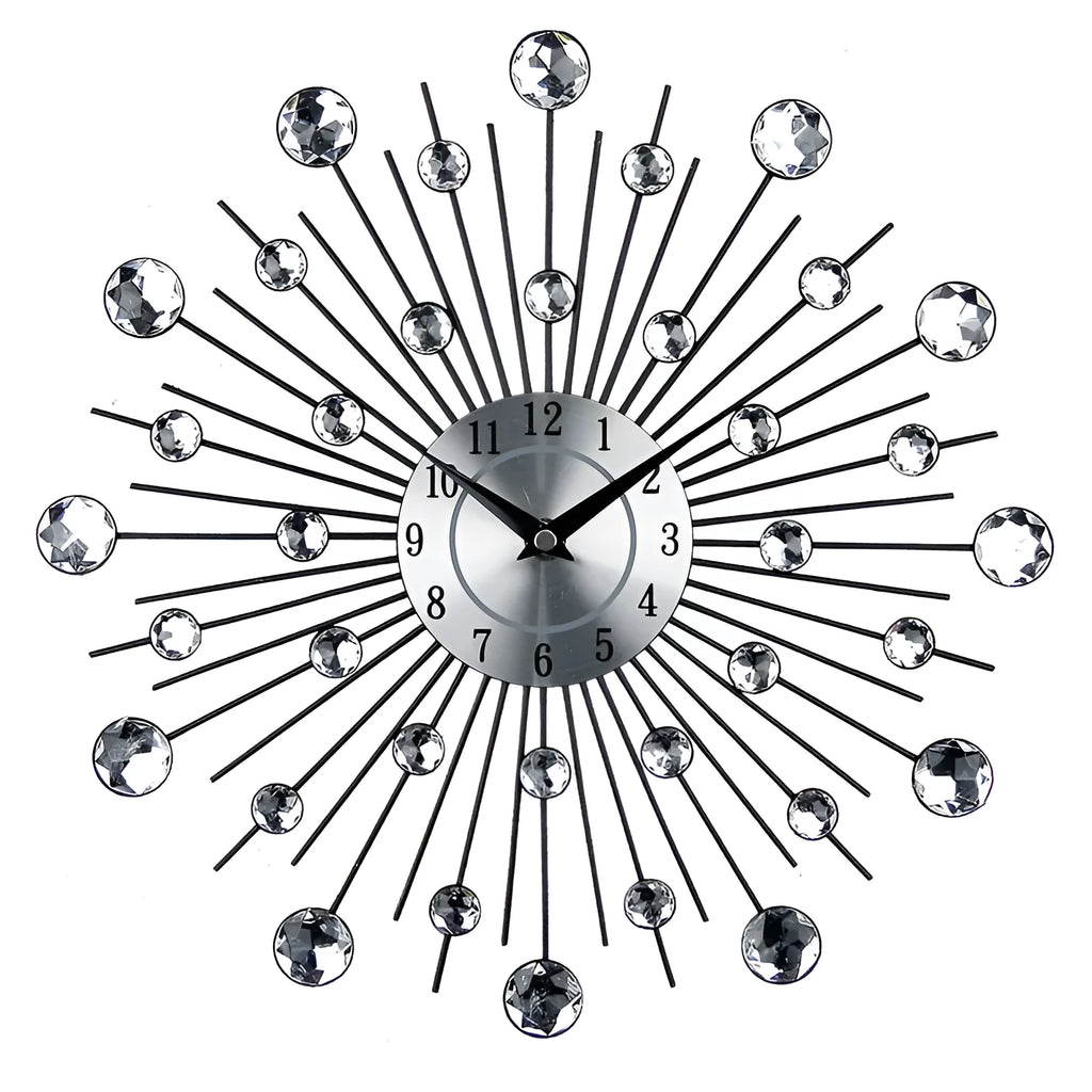Large round silver wall clock with numbers and metal frame on a wall.