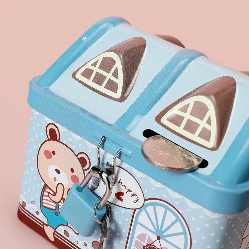 Blue house-shaped tinplate piggy bank with coin slot on removable lid