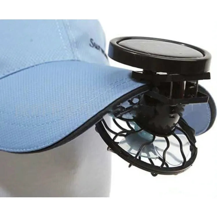 Black portable solar powered fan with clip for camping and outdoor cooling