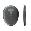 Black magnetic wireless charger C01 with Type-C port on a surface