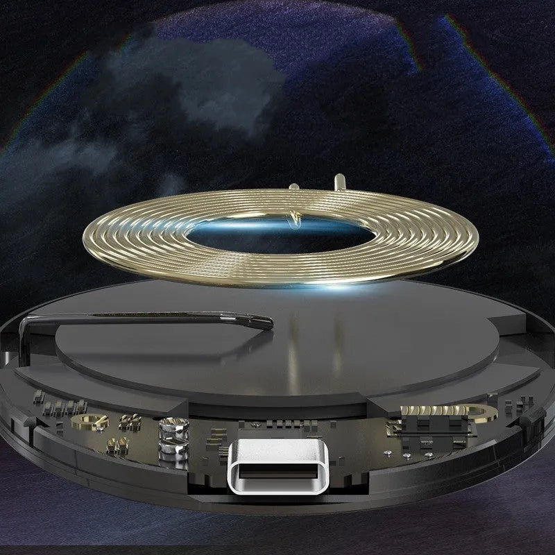 Black magnetic wireless charger C01 with Type-C port on a surface