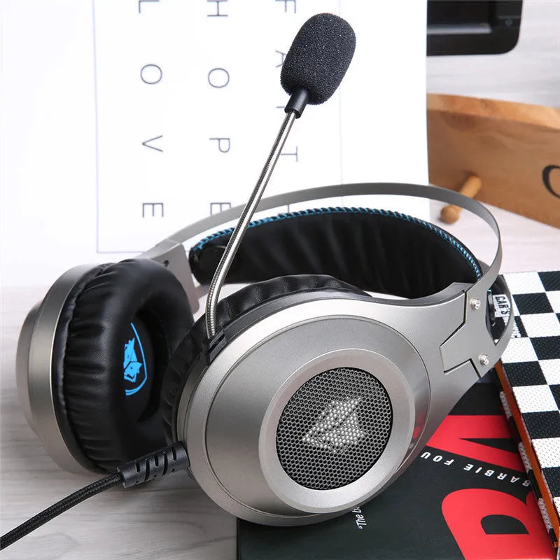 Black wired USB over-ear computer headset with a built-in microphone on the cable.