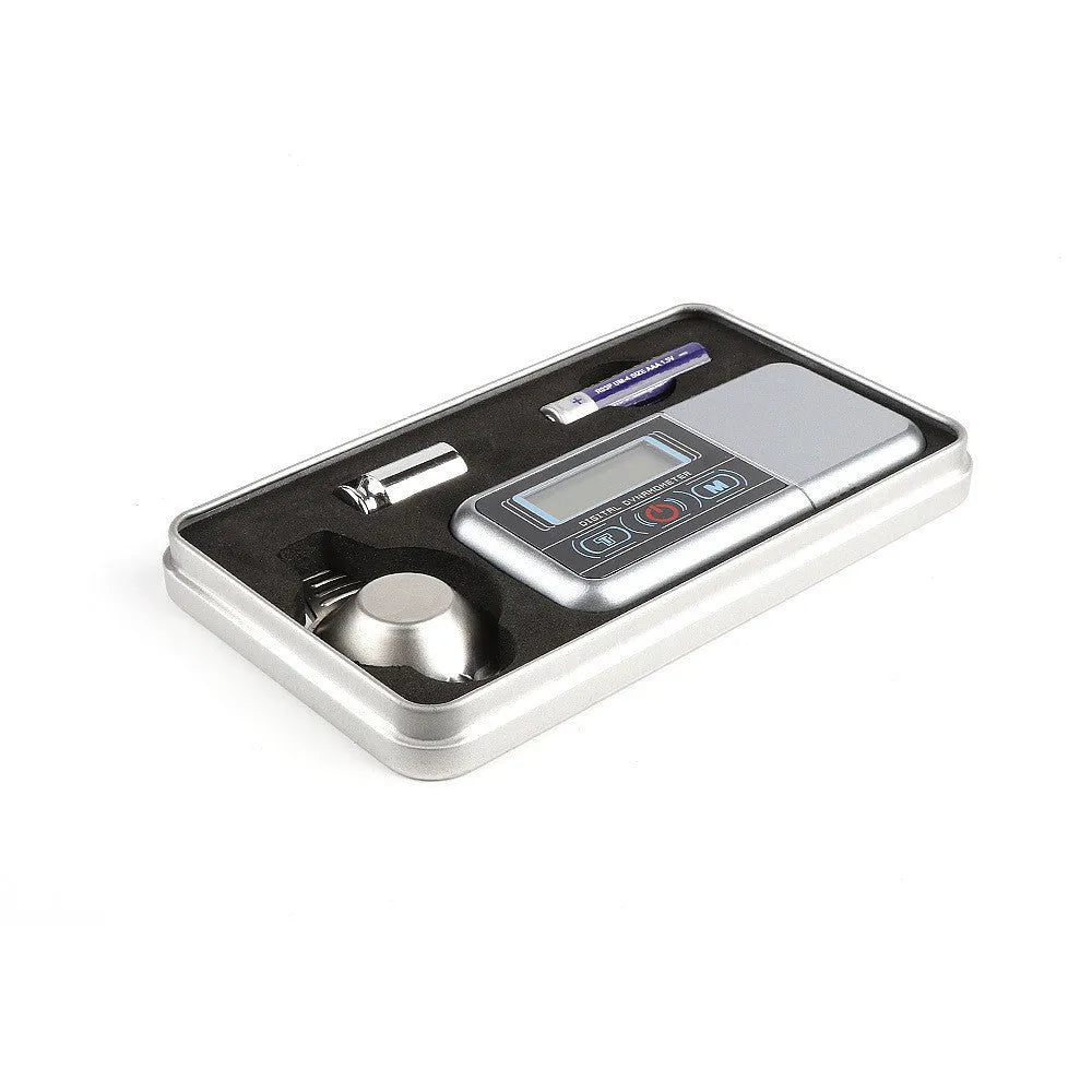 Electronic digital precision scale with display showing weight, used for weighing jewellery and herbs.