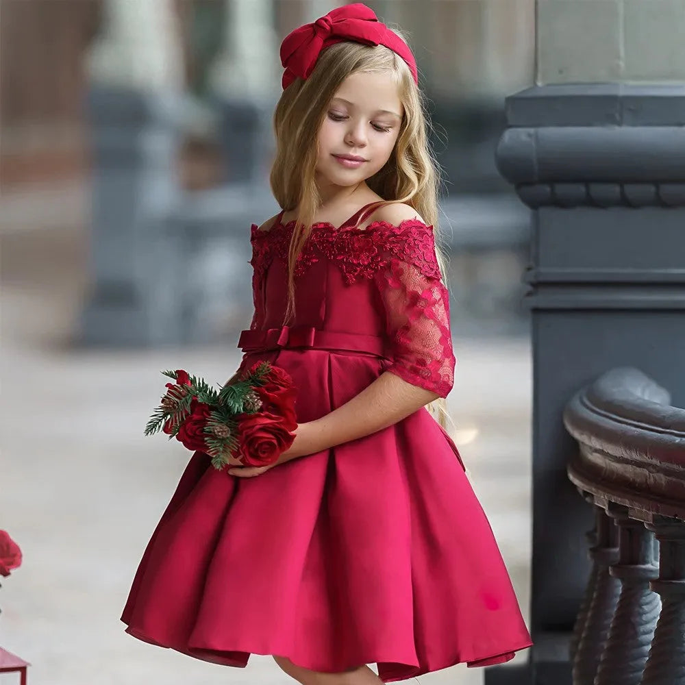 Girls lace dress in polyester fibre available in colours deep red, pink, green, red, and white.