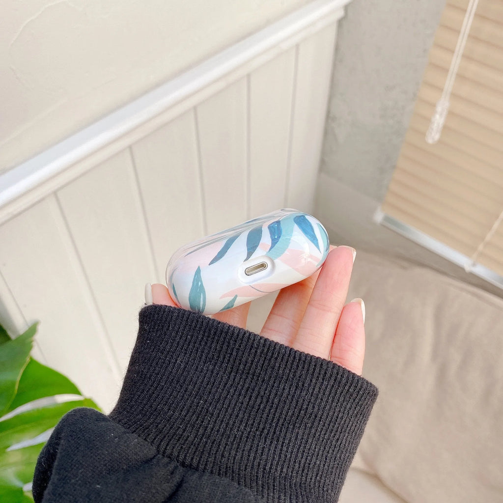 Blue and Green banana leaves pattern soft TPU protective case for Apple AirPods.
