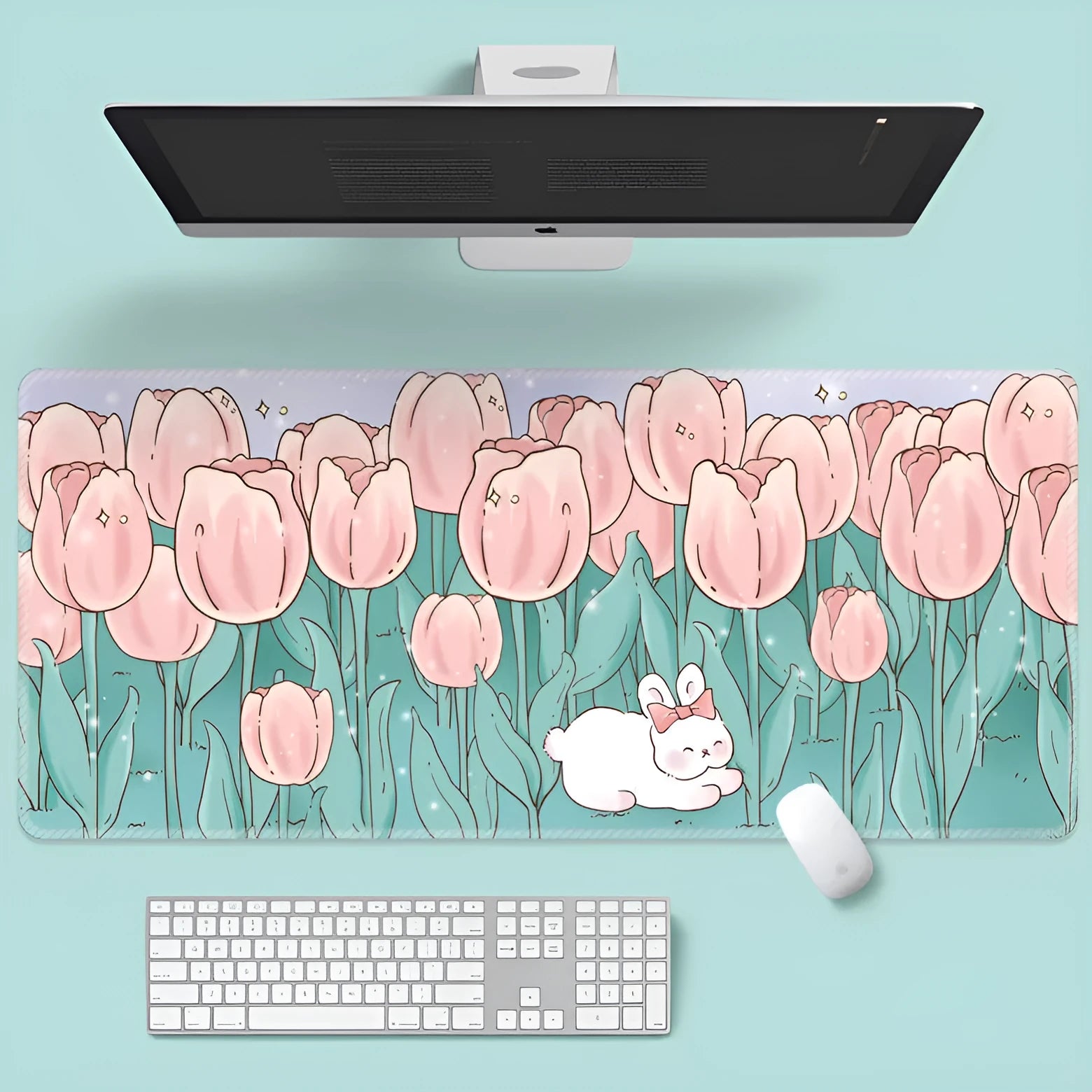 Large floral pattern mouse pad with non-slip rubber base on a wooden desk.