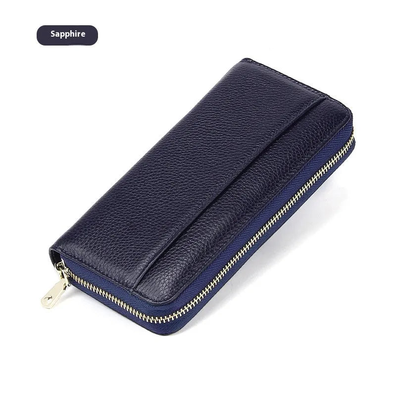 Long genuine leather women's wallet in a choice of solid colours, showing large capacity and anti-theft card swiping function.