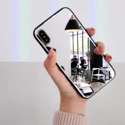 Black iPhone case with a square glass mirror on the back, compatible with iPhone X, 7 Plus, and 8 Plus.
