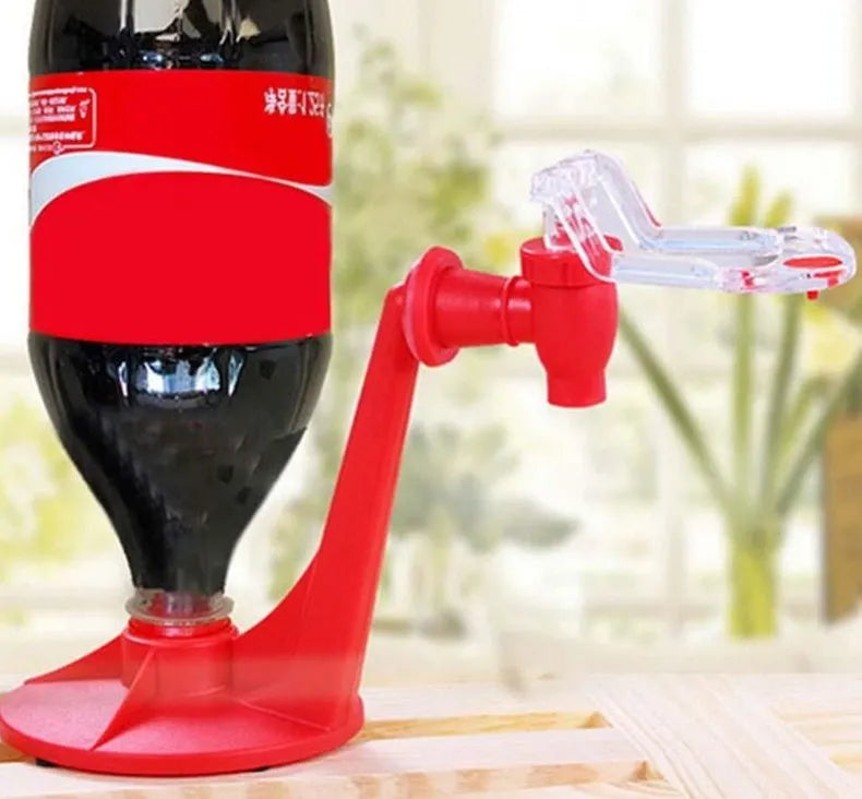 Red Magic Tap soda bottle dispenser attached to inverted 2 litre bottle with push-button mechanism