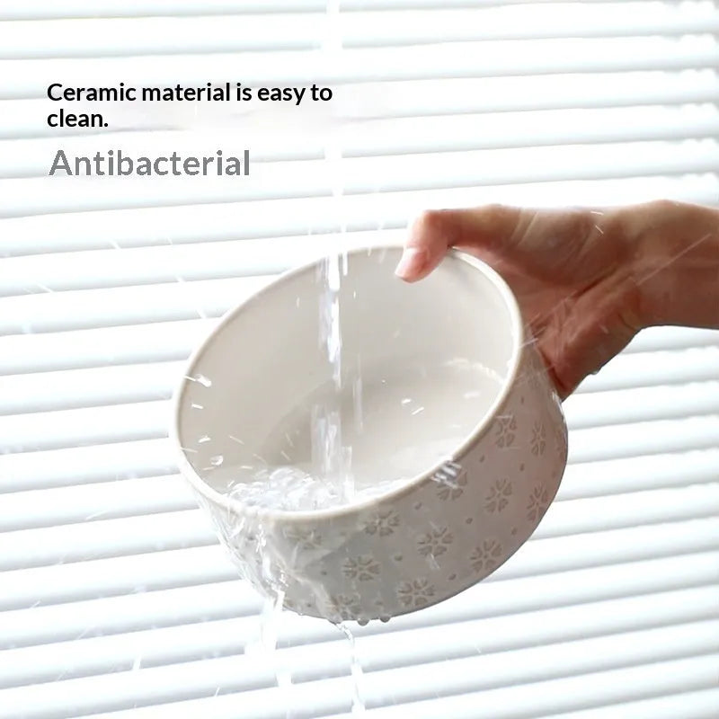 Ceramic elevated anti-spill dog dish with snowflake inner arc design 21cm diameter