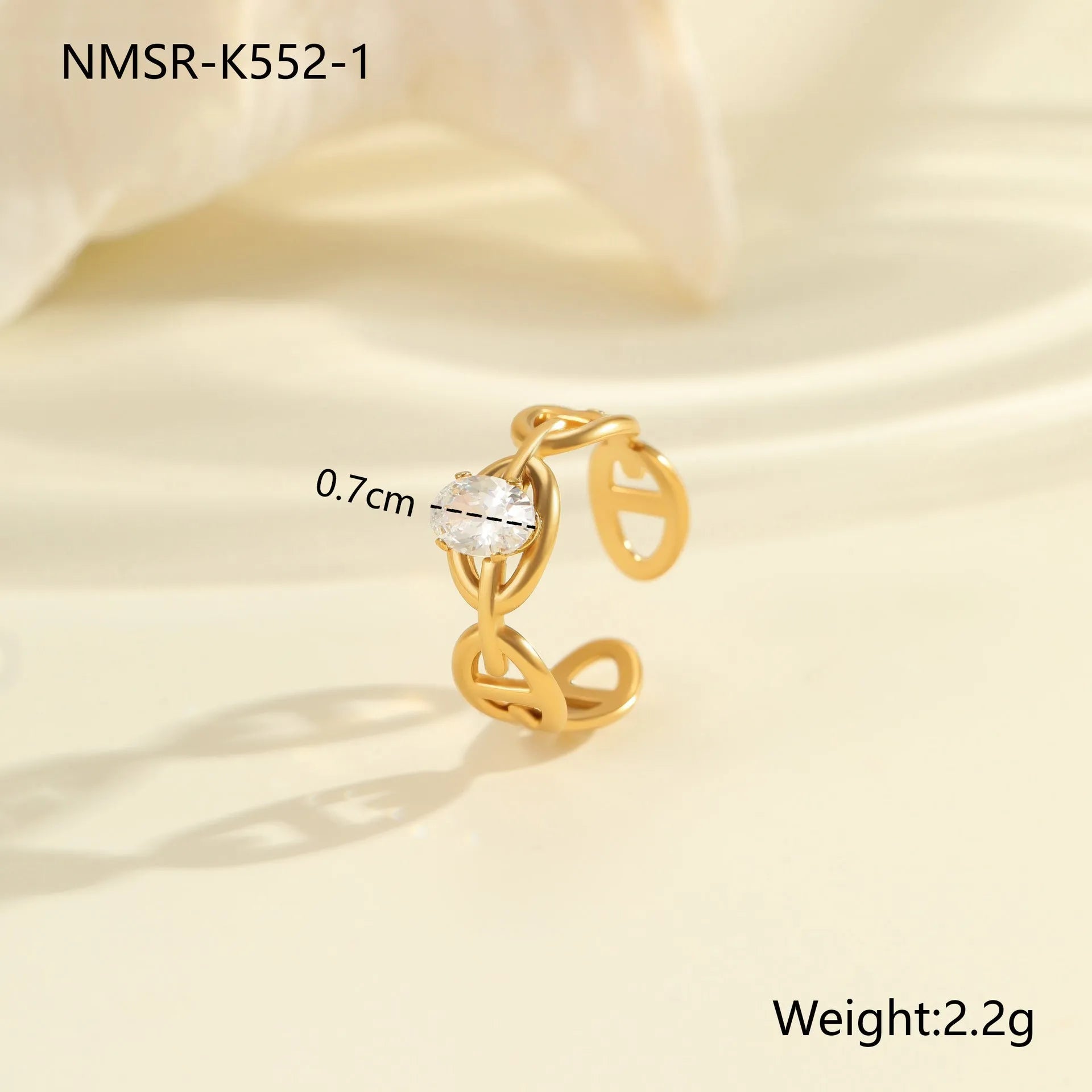 Geometric open mouth zircon fashion ring in stainless steel, showing adjustable design.