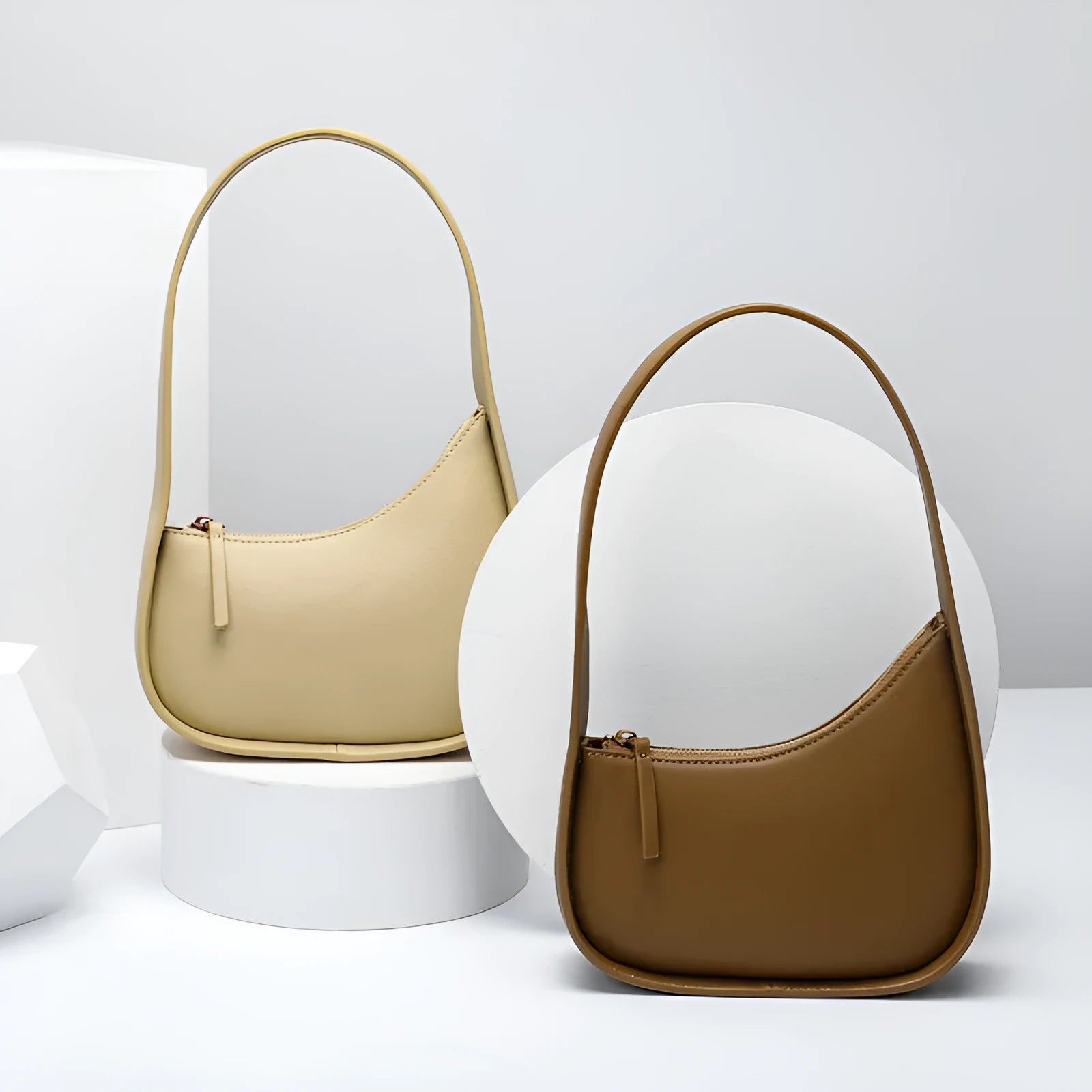Genuine leather ladies shoulder bag in half moon shape with wide strap