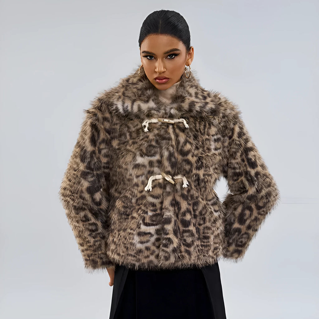 Leopard print women's coat with a buckle lapel fastening and regular sleeves.