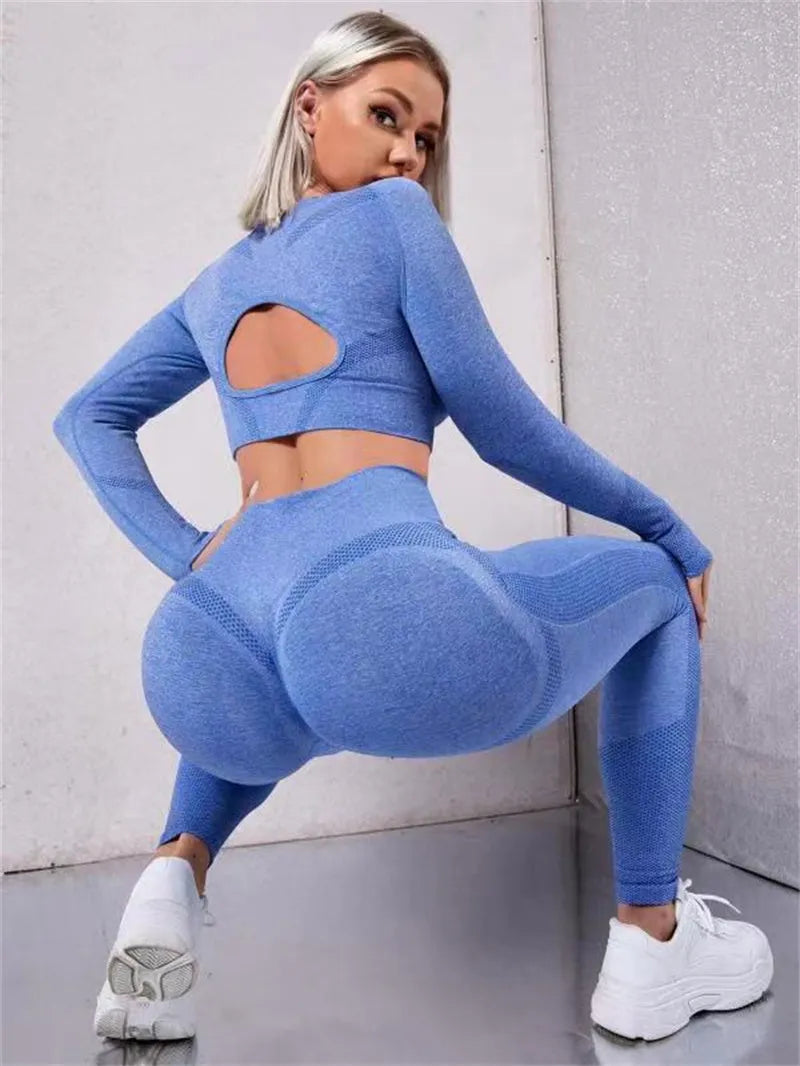Two-piece sports suit with long sleeve hollow top and high waist seamless leggings in green