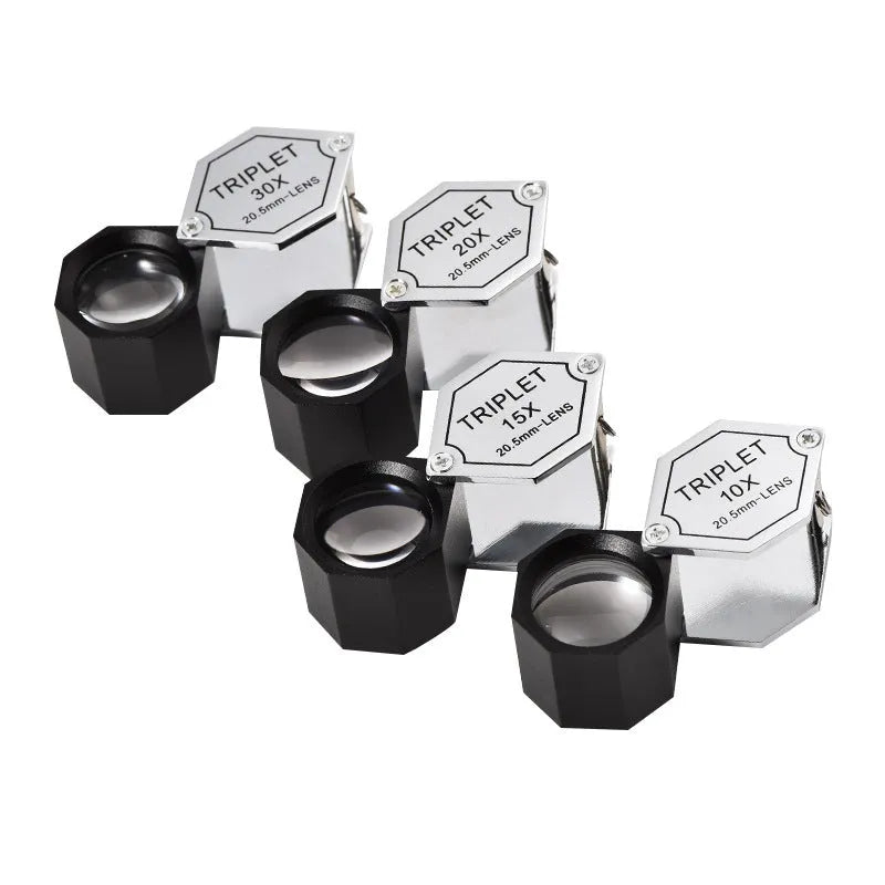 Handheld portable magnifying glass with metal housing and optical glass lens for jewellery inspection
