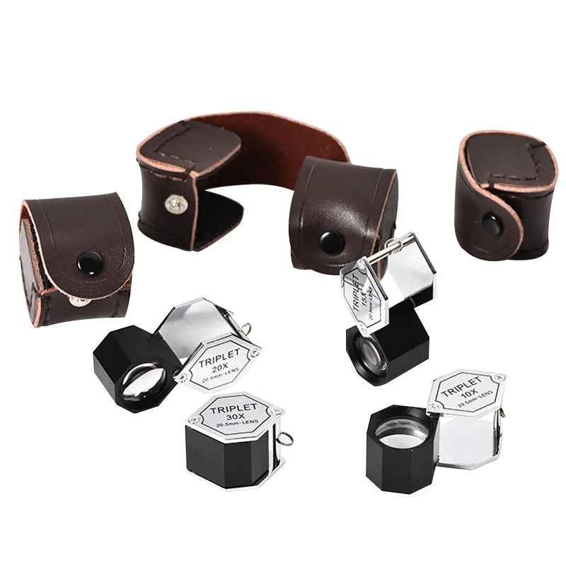 Handheld portable magnifying glass with metal housing and optical glass lens for jewellery inspection