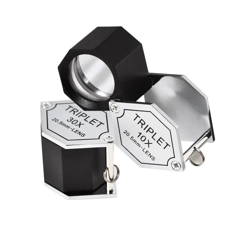 Handheld portable magnifying glass with metal housing and optical glass lens for jewellery inspection