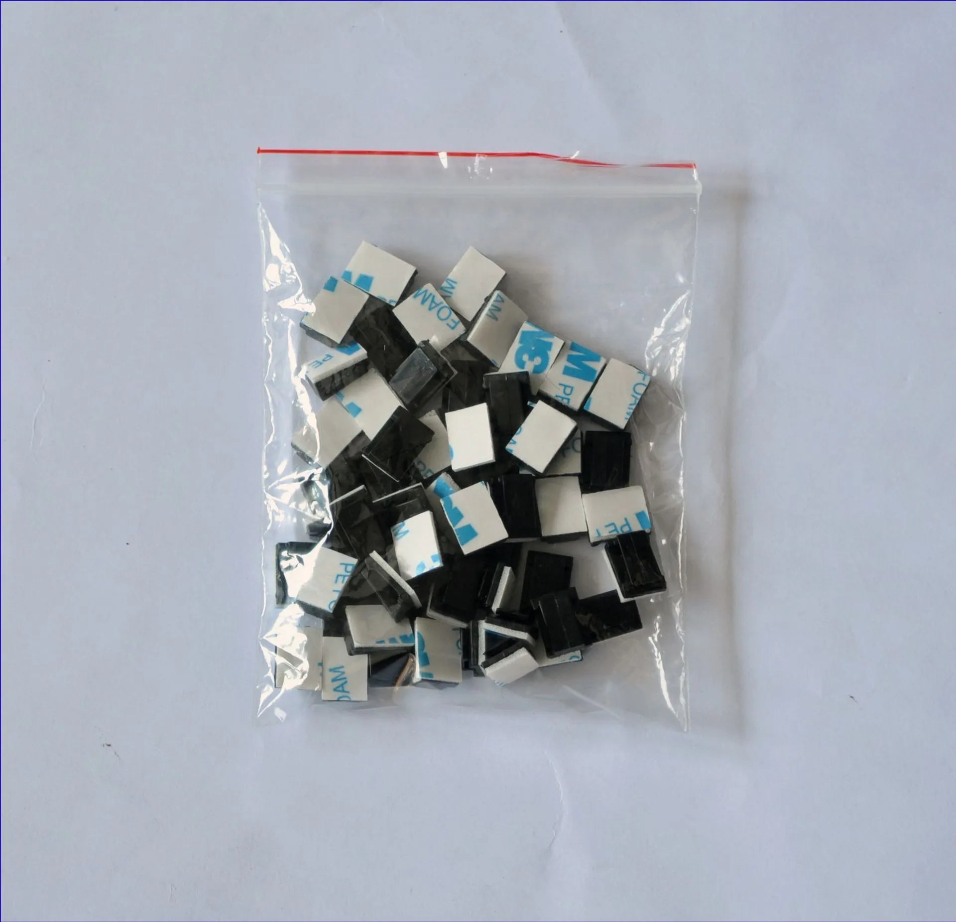 Black PA66 nylon wire management clips for automotive and electronic cable organisation