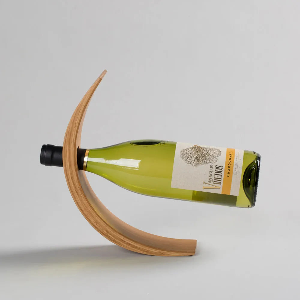 Creative bamboo wine bottle shelf in straight style with walnut wood finish on kitchen countertop