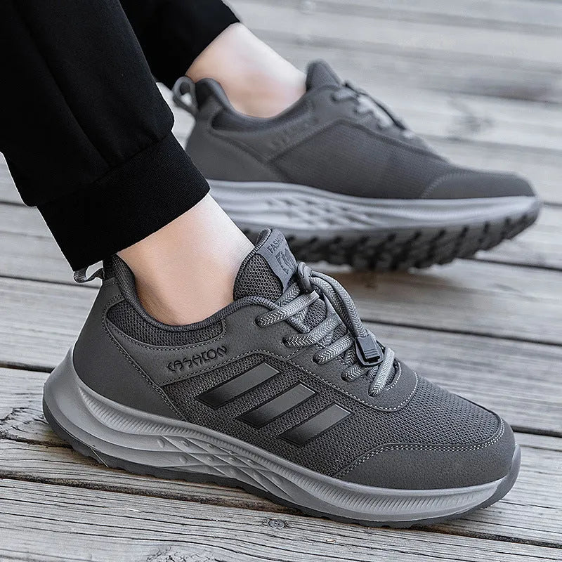 Adult unisex breathable mesh slip-on shoes in black, purple, and dark grey with an elastic band.