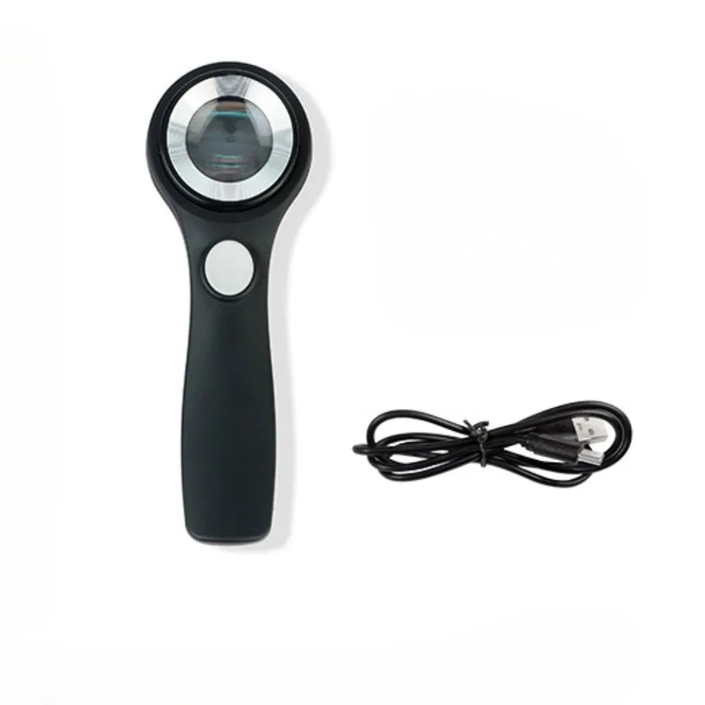 Handheld appraisal magnifying glass with optical glass lens in black and silver on white background