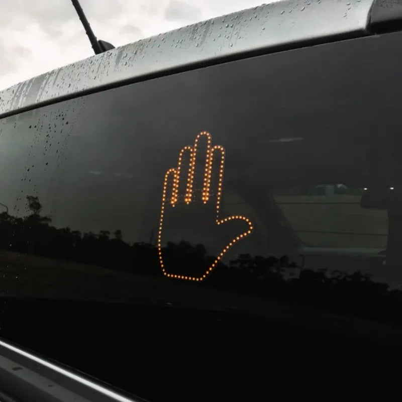 Black plastic gesture light with 176 LED beads showing a middle finger gesture, with remote control