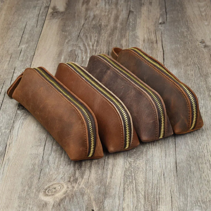 Handmade cowhide leather pencil case with zipper closure showing square 18cm x 6cm x 6cm dimensions