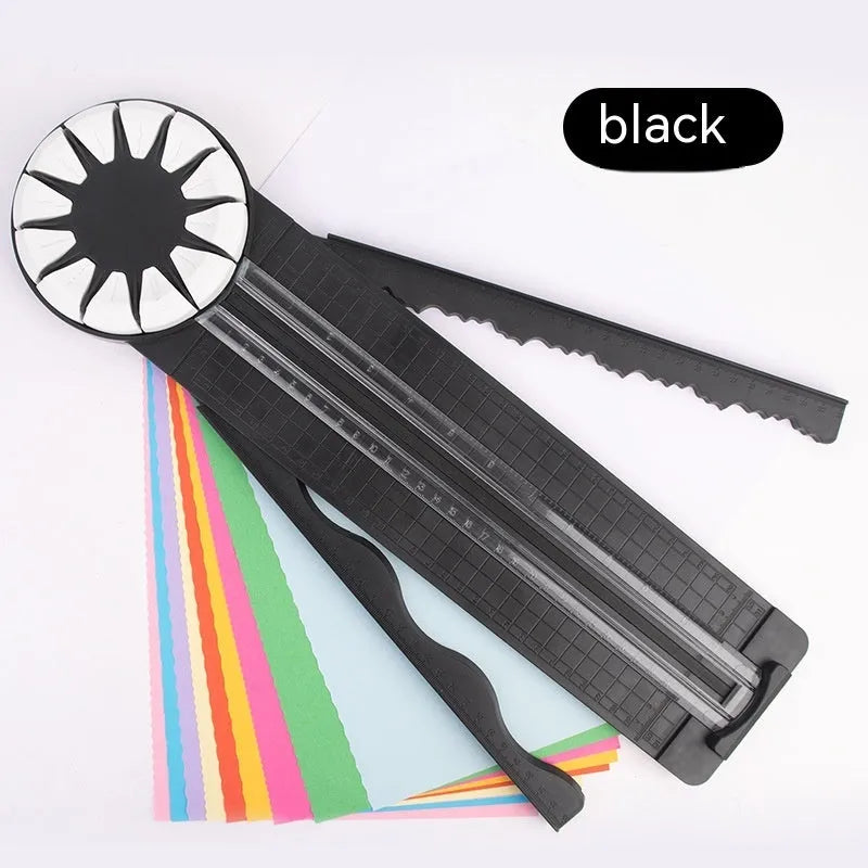 Pink plastic paper cutting machine with 12 pattern functions measuring 46.2 cm long