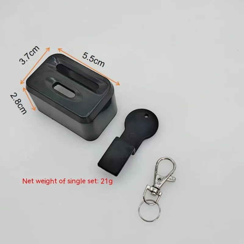 Black plastic ABS seat belt lock catch clamp holder installed on car seat belt webbing