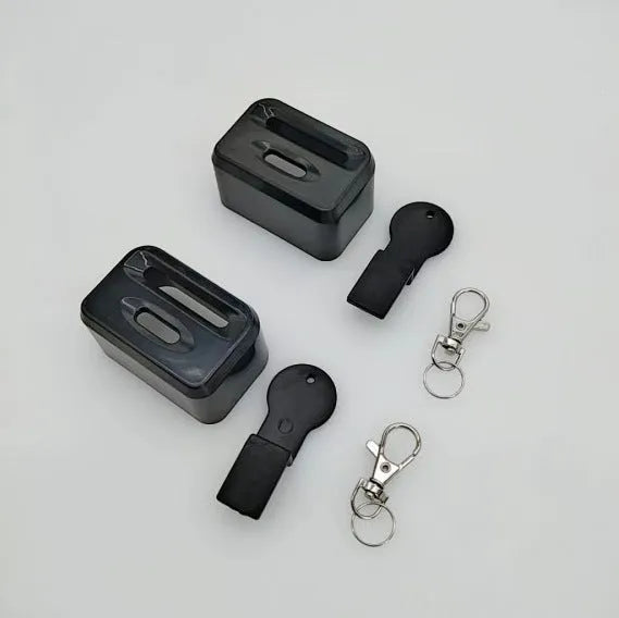 Black plastic ABS seat belt lock catch clamp holder installed on car seat belt webbing