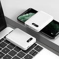 Black or white portable power bank with multi USB ports, showing dimensions of 92mm by 63mm.