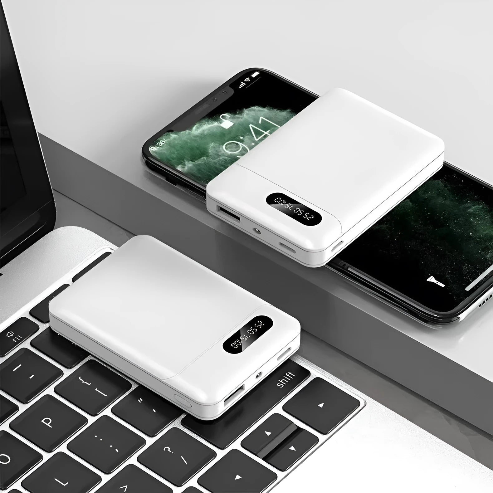 Black or white portable power bank with multi USB ports, showing dimensions of 92mm by 63mm.
