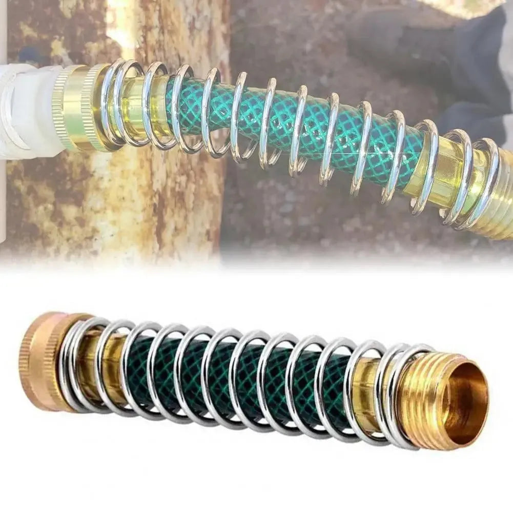 Brass garden hose connector with a visible silver spiral spring and 3/4 inch threaded ends.
