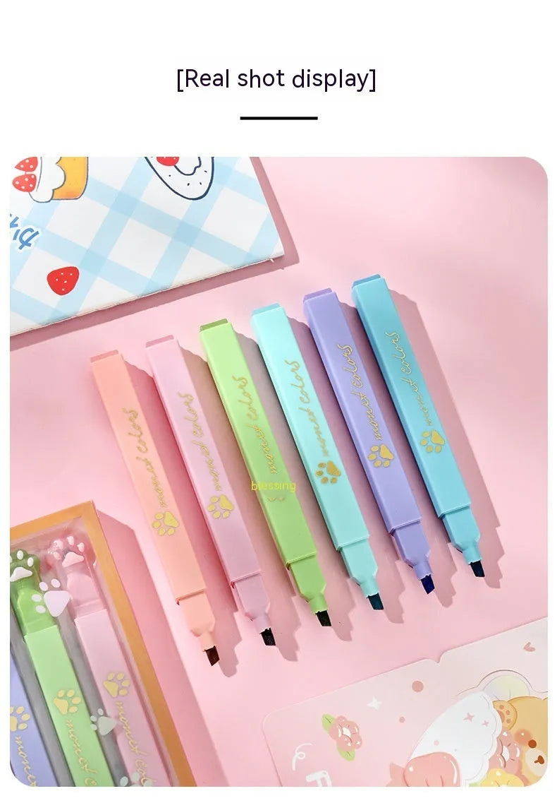 Cat's Paw box of six fluorescent marking pens with oblique heads in assorted colours.