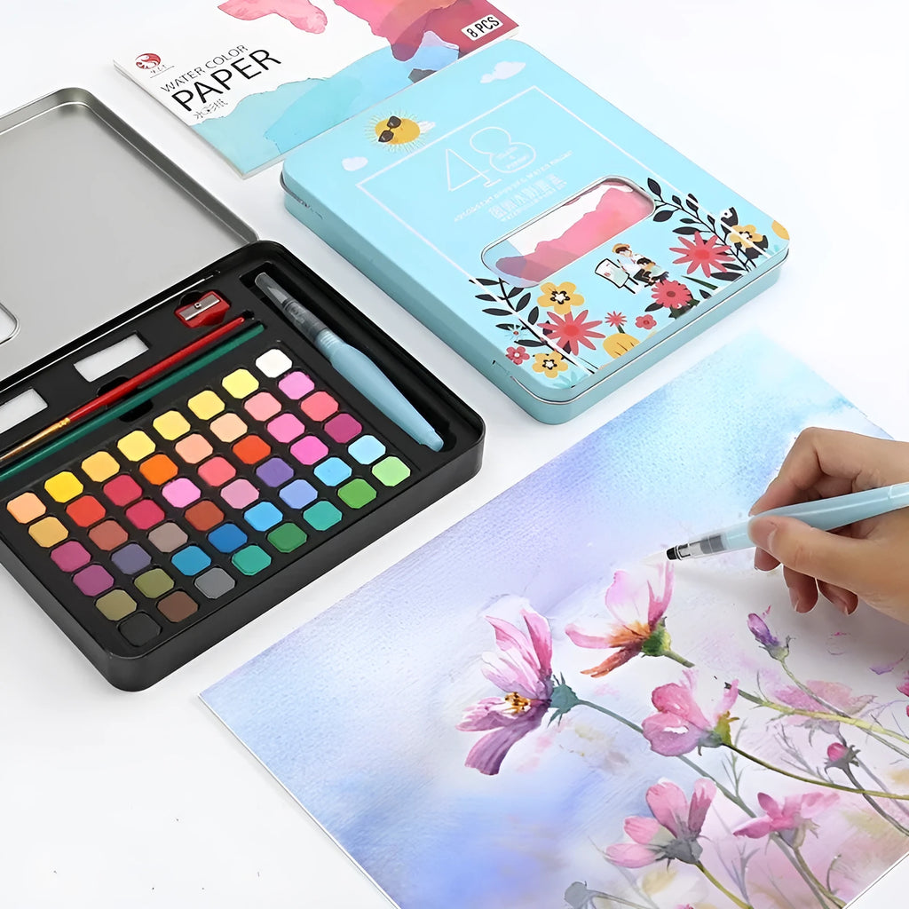 Solid watercolour paint set showing 48 colour pans with black knight, girl pink and sunshine blue shades