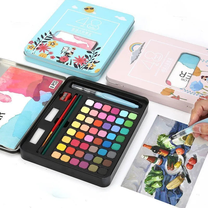 Solid watercolour paint set showing 48 colour pans with black knight, girl pink and sunshine blue shades