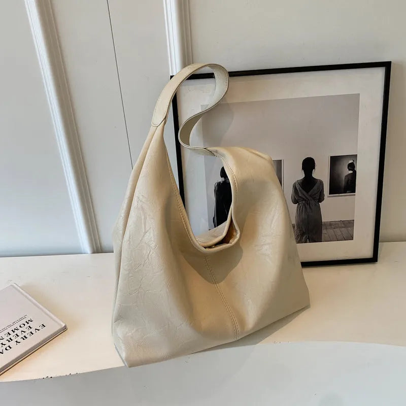 Soft leather casual shoulder bag with large capacity and street trend design in multiple colour options