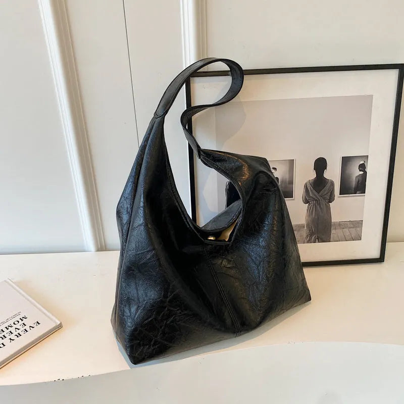 Soft leather casual shoulder bag with large capacity and street trend design in multiple colour options