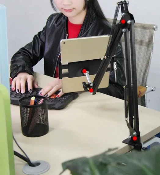 Support phone tablet stand in black on a desk, holding a smartphone for hands-free viewing
