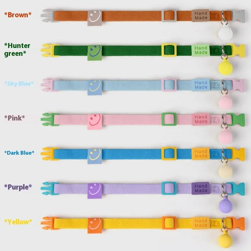 Solid colour elastic polyester dog collar for small dogs, shown in seven colour options.