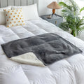Lambswool waterproof pet blanket duvet in gray 75x100cm on a sofa