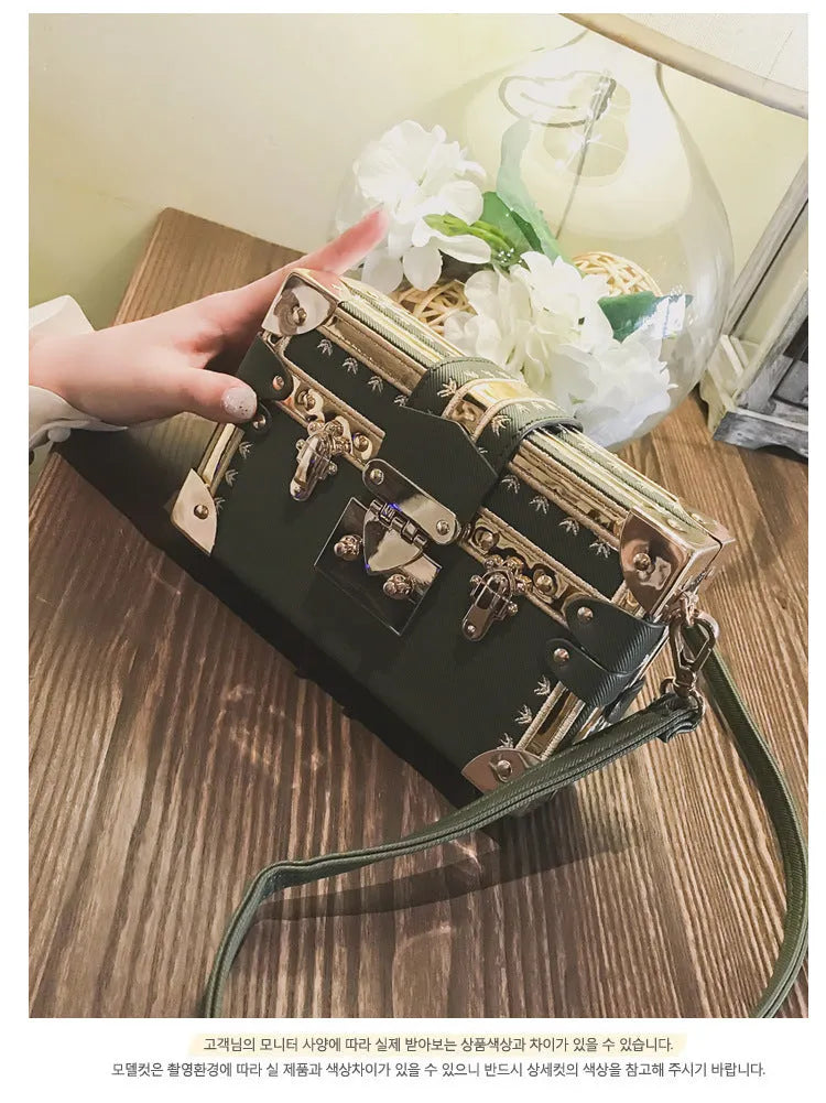 Women's hard PU shoulder bag with flap closure and rivet decoration in black or green